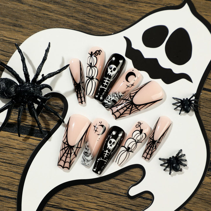 Artificial nail art in Halloween style with graffiti designs Kalsten