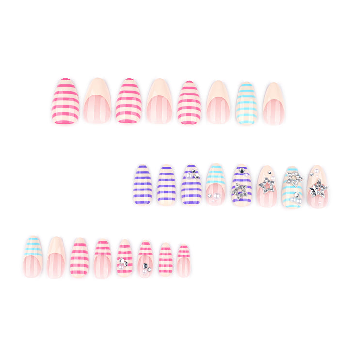Artistic acrylic stiletto nails with glitter and star embellishments Kalsten