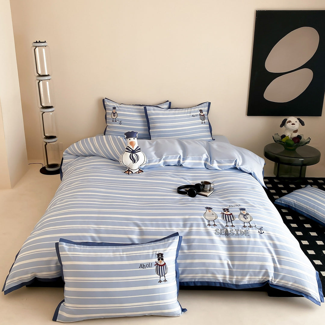 Maritime cotton satin bedding set with embroidered seagull motifs and fine stripe pattern
