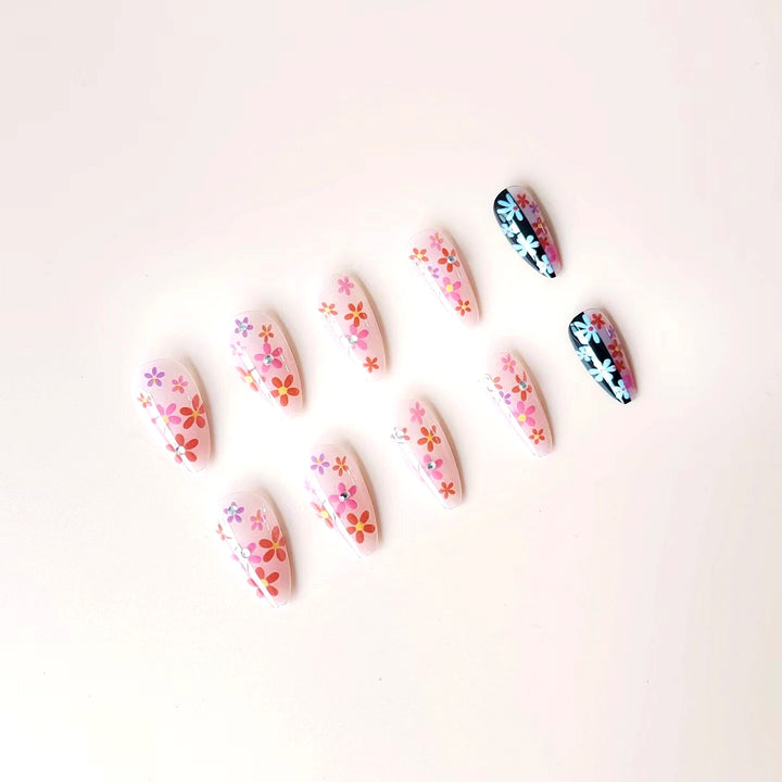 Artificial nail set with floral 3D embellishments and glitter accents Kalsten