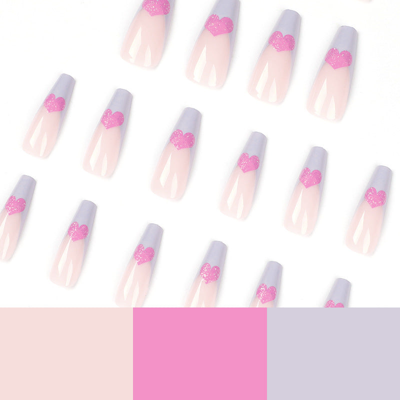 Artful stiletto nails with colorful heart designs Kalsten