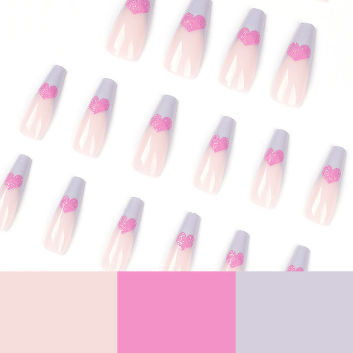 Artful stiletto nails with colorful heart designs Kalsten