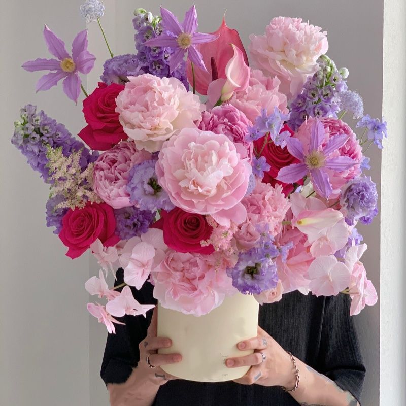 Decorative Floral Arrangement with Stylish Vase