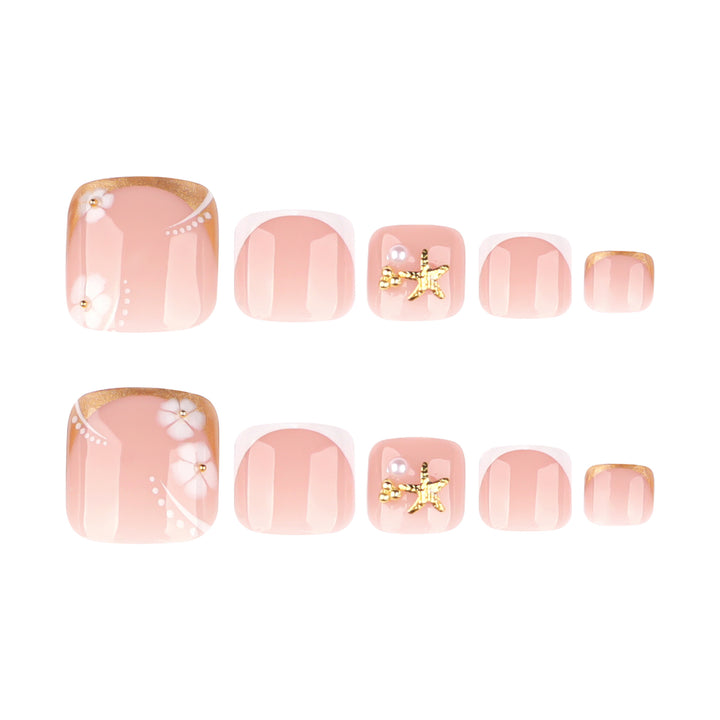 Artful toenail art with delicate flower and glitter accents Kalsten