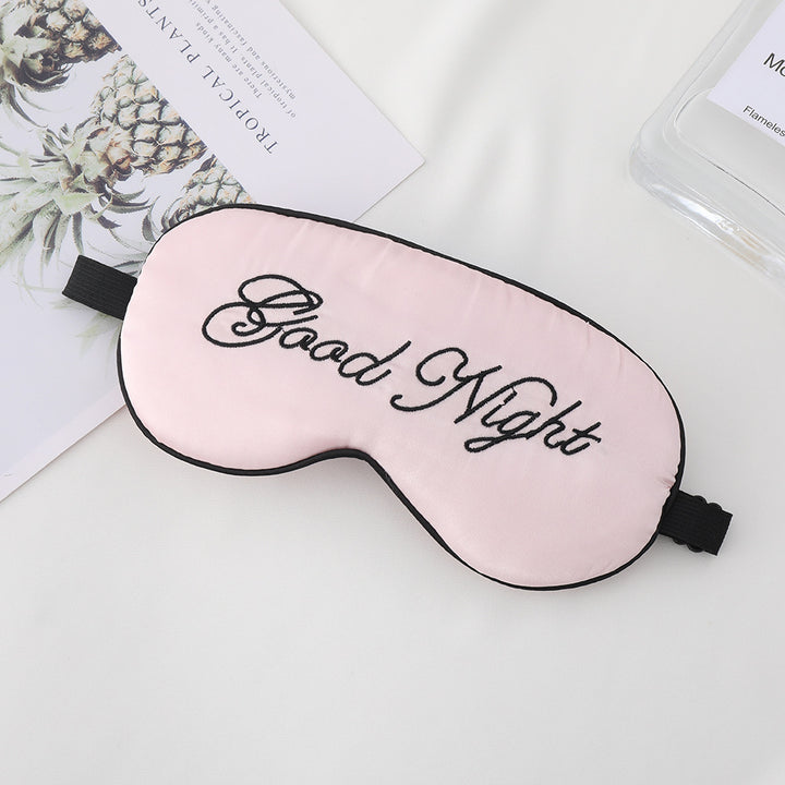 Unisex embroidered contoured sleep mask with decorative text embroidery and adjustable elastic band Kalsten