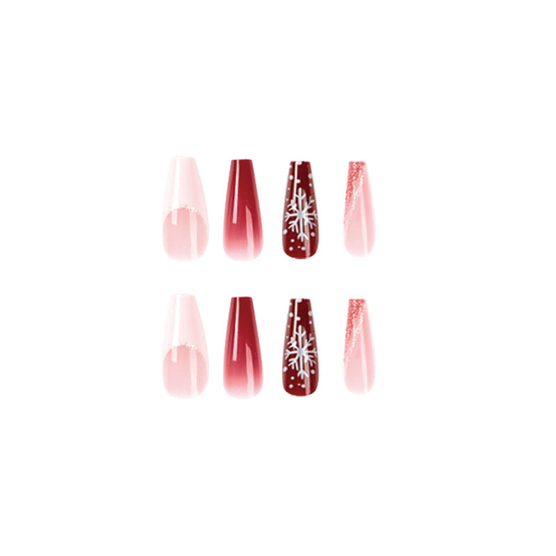 Artful Christmas nail extensions with elegant glitter and snowflake design Kalsten