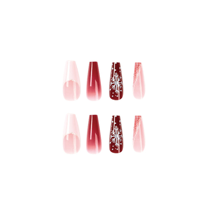 Artful Christmas nail extensions with elegant glitter and snowflake design Kalsten
