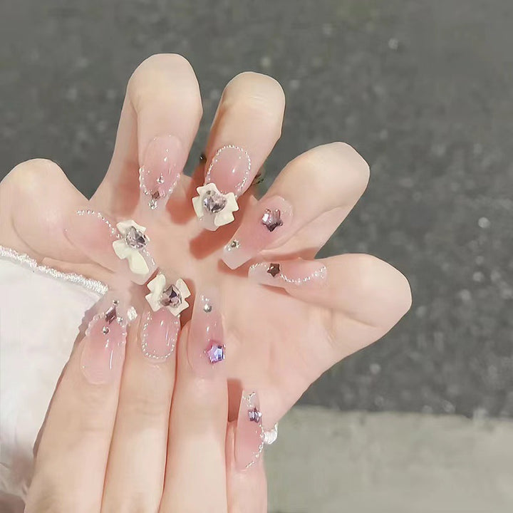 Artificial nails with floral accents Kalsten