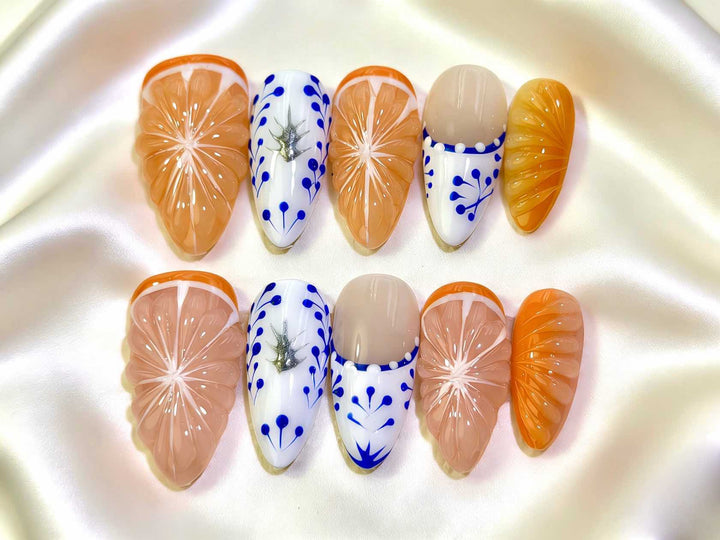 Artistic Press-On Nail Set with Floral and Green Accents