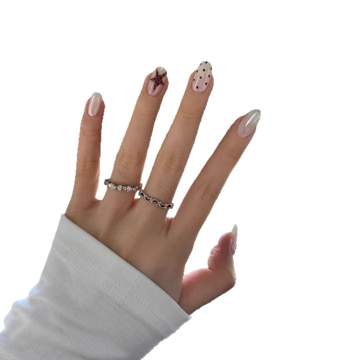 Artistic Press-On Nail Art Set with Creative Star and Polka Dot Designs