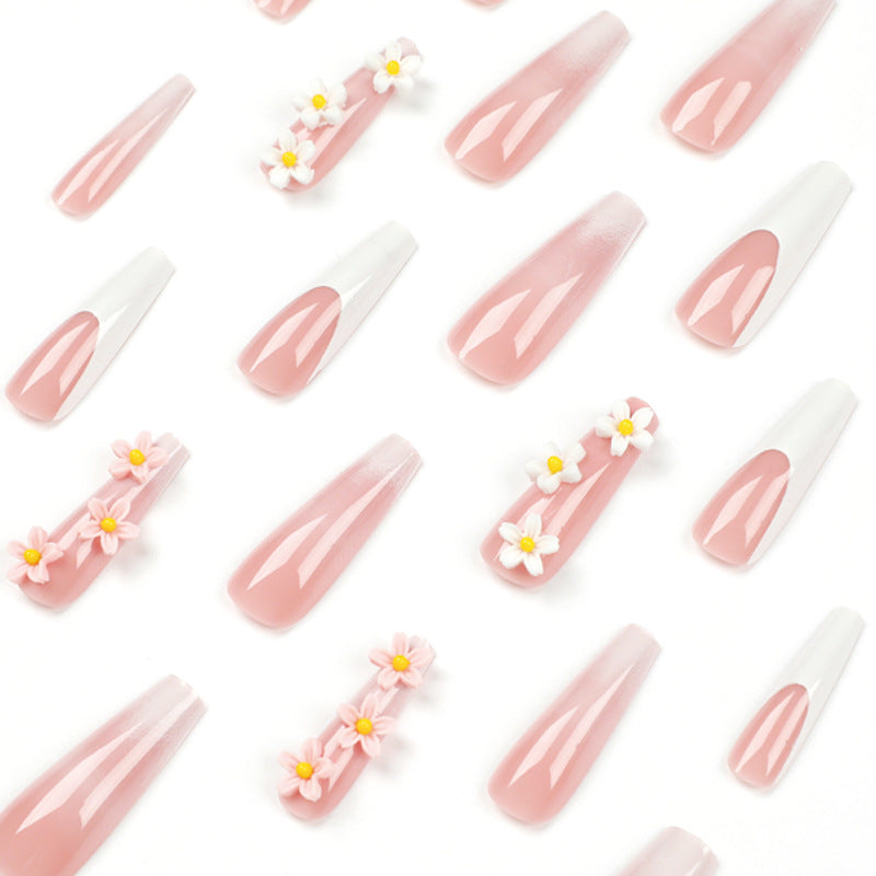 Artful nail extensions with elegant gradient and creative floral accents Kalsten