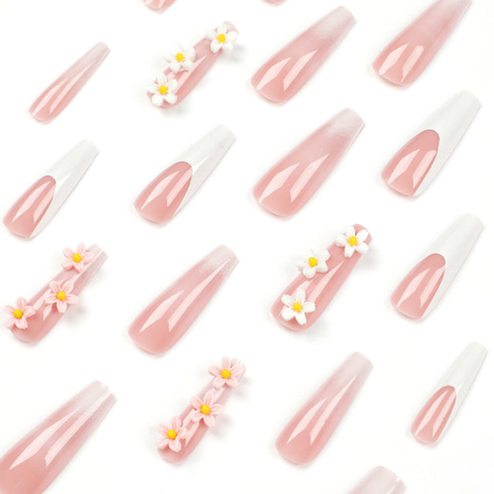Artful nail extensions with elegant gradient and creative floral accents Kalsten