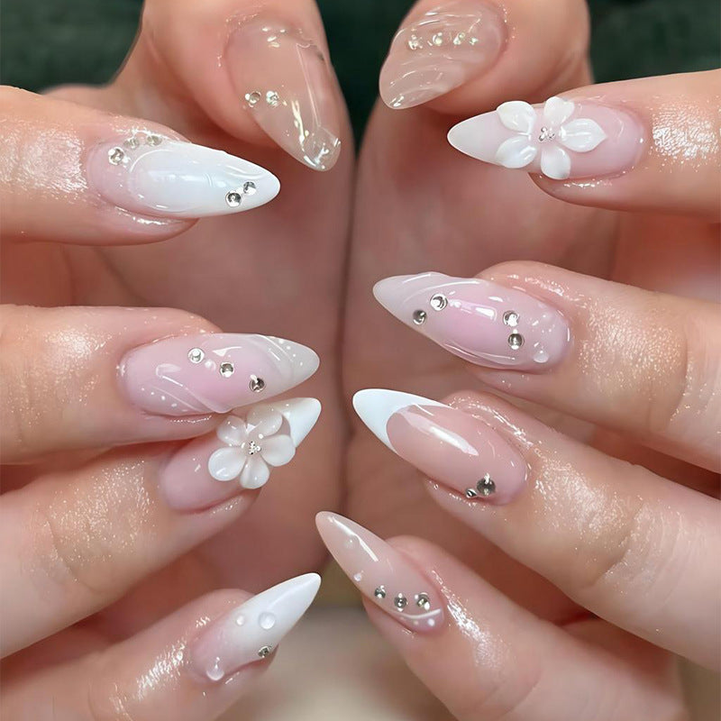 Art nail set with elegant flower and glitter details Kalsten