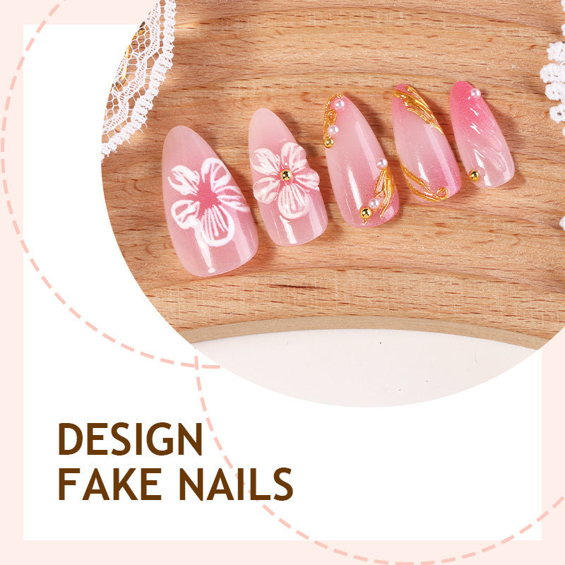Creative nail art set with floral and golden accents Kalsten