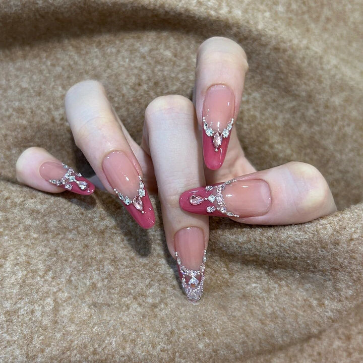 Artificial nails with sparkling rhinestone accents Kalsten