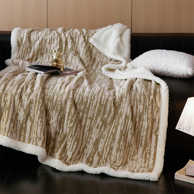 Cozy throw blanket with Sherpa lining and jacquard pattern