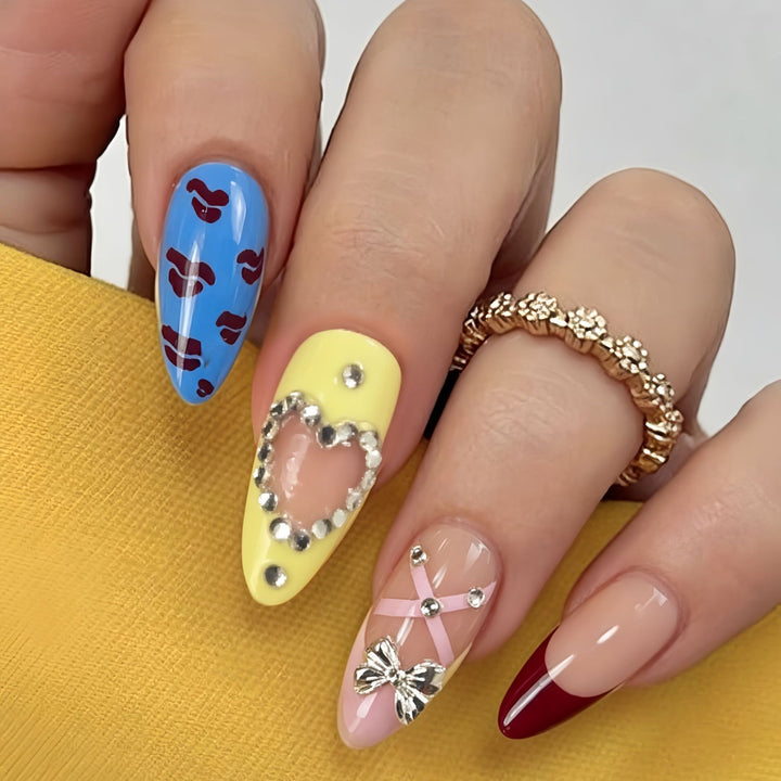 Artificial nails with playful design and 3D embellishments Kalsten