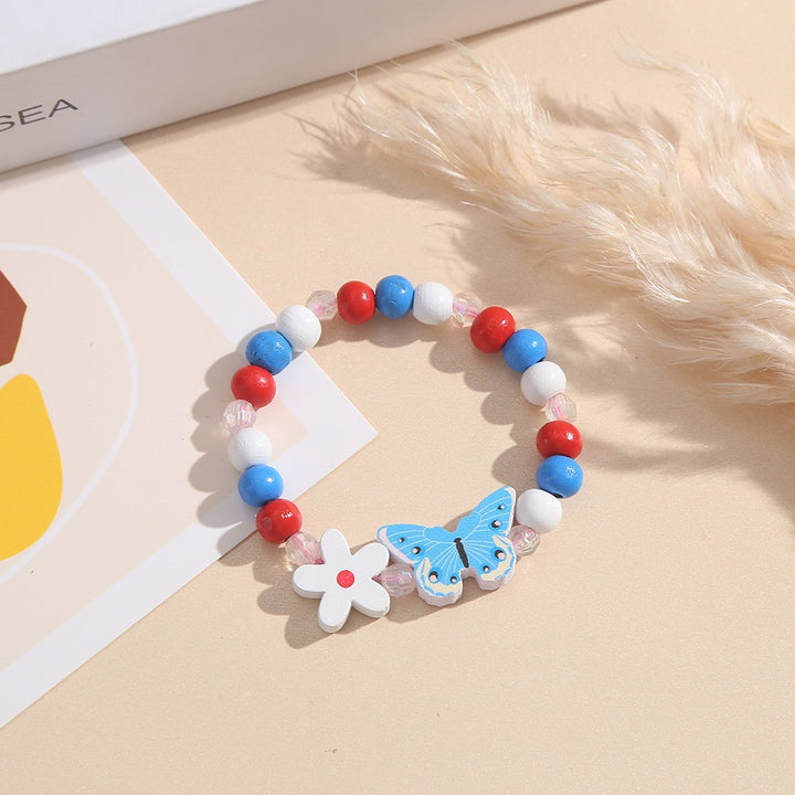 Playful bracelet with heart and butterfly charms Kalsten
