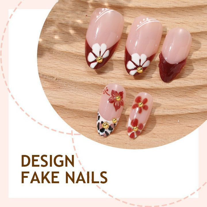 Elegant artificial nails with floral accents and glitter Kalsten