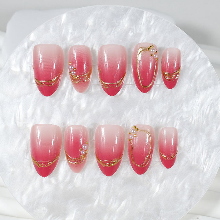 Acrylic nail set with elegant ombré designs and glitter accents Kalsten