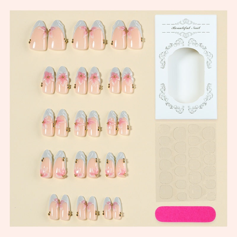 Creative nail art set with delicate flower design and glitter accents Kalsten