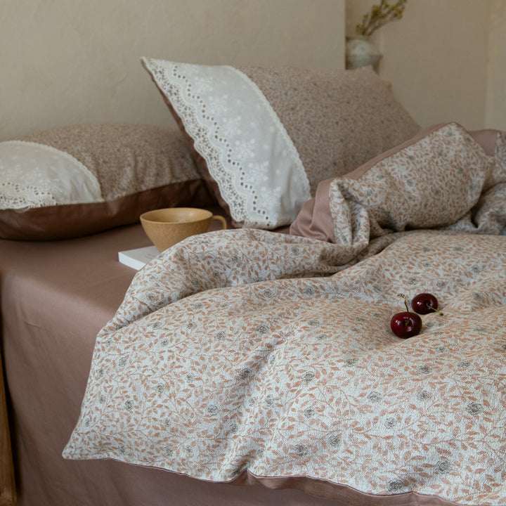 Elegant bedding set made of cotton satin with delicate flower jacquard structure and lace embroidery detail