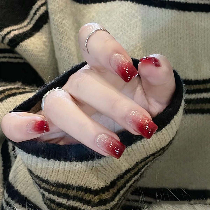 Glamorous artificial nails with glitter gradient Kalsten