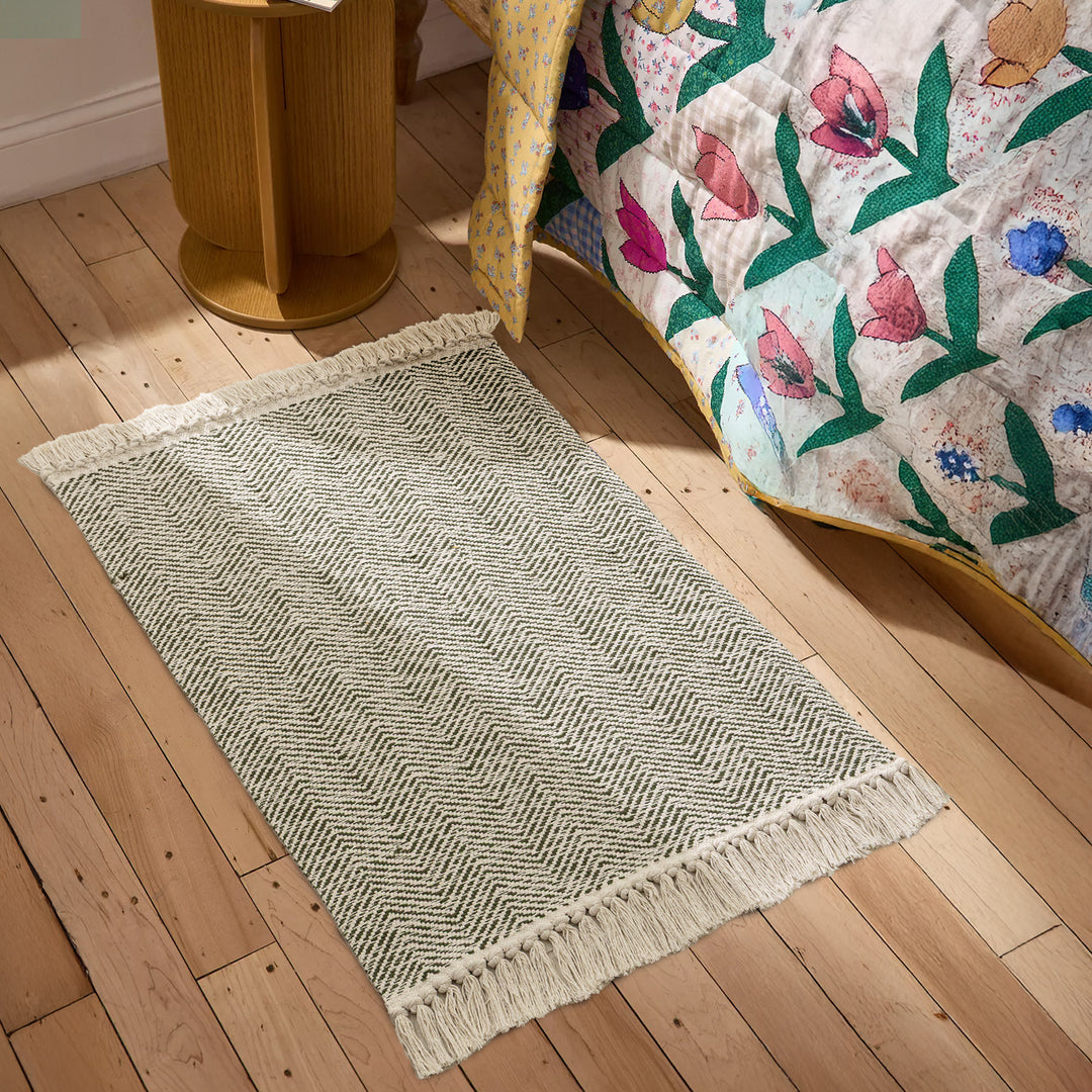 Braided runner rug with herringbone pattern and fringe edge Kalsten