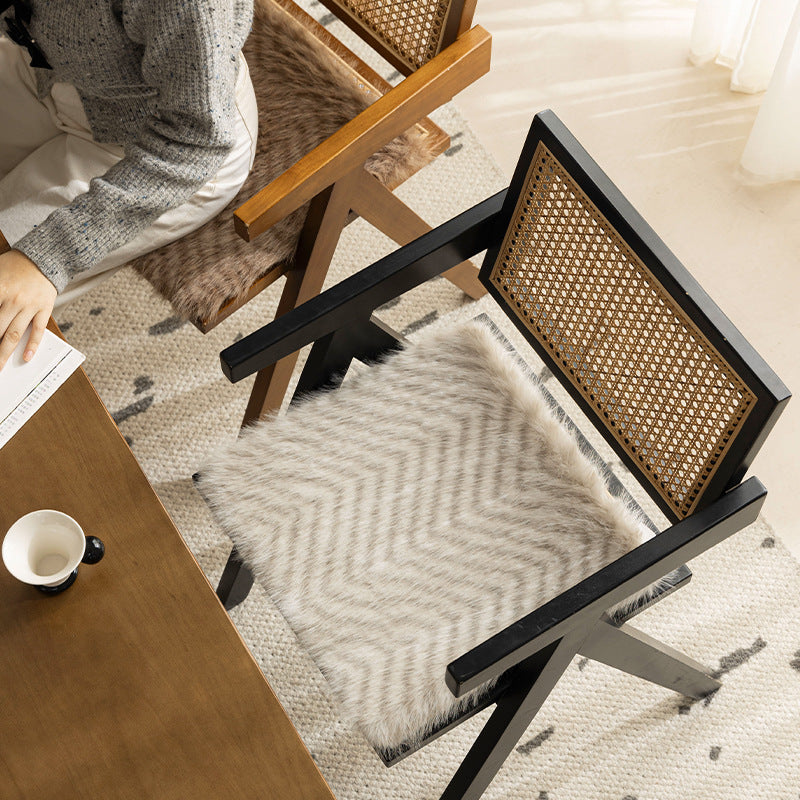 Square chair cushion made of cozy artificial fur with non-slip base and strap attachment Kalsten