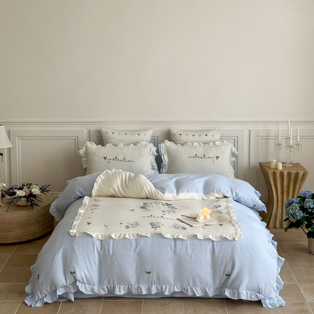 Cotton bedding set in country house style with ruffle edge and fine floral embroidery Kalsten