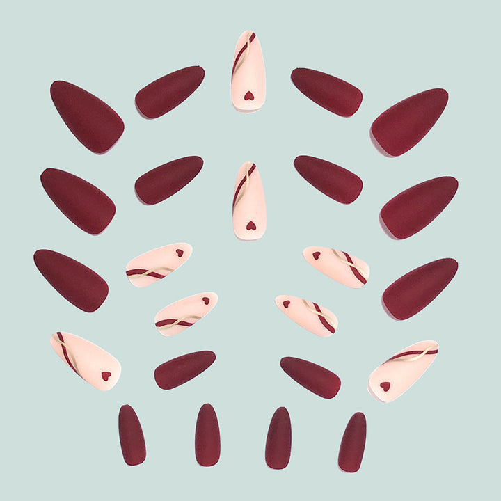 Artful and elegant artificial nails with heart decorations Kalsten