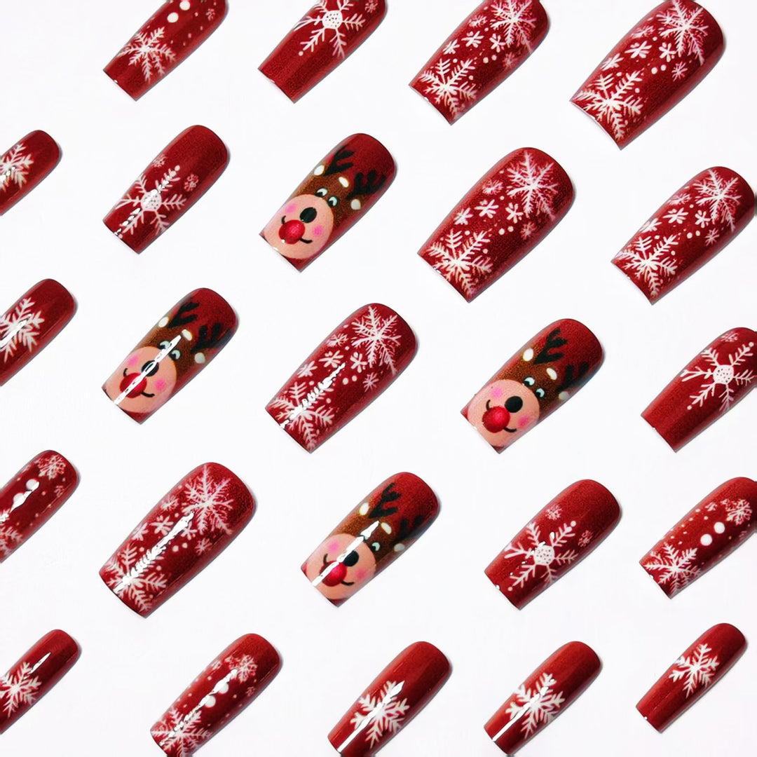 Artificial nails with festive reindeer and snowflake design Kalsten