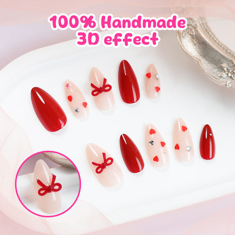 Artificial nail set with festive heart and bow accents Kalsten