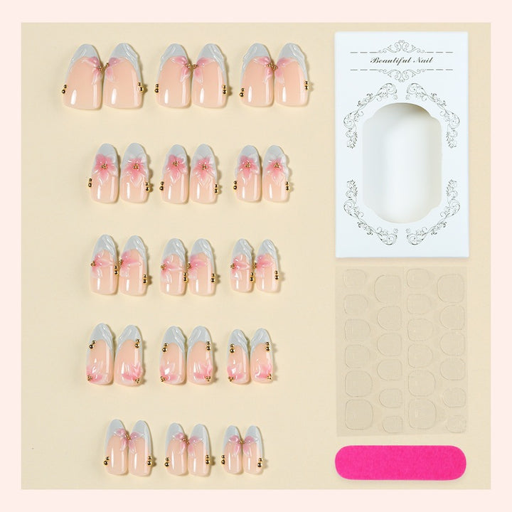 Creative nail art set with delicate flower design and glitter accents Kalsten