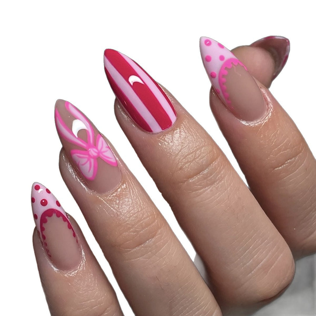 Nail set with playful bow and stripe pattern Kalsten