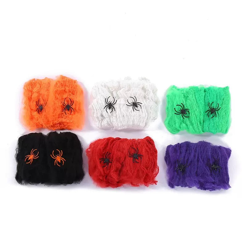 Decorative Halloween spider web with artificial spiders