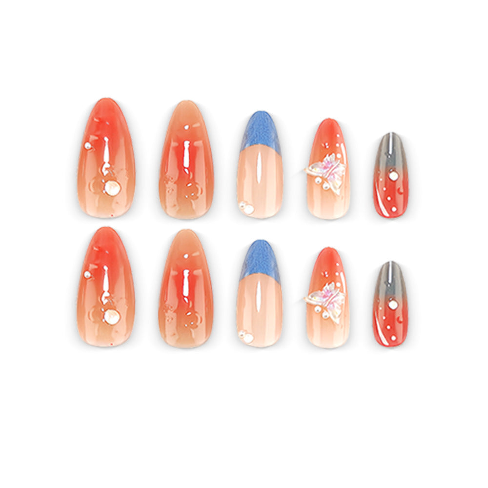 Artful nail art with pearls and butterfly details Kalsten