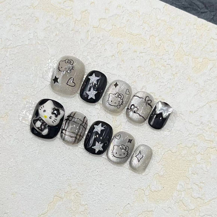 Fun and Whimsical Press-On Nail Set with Cartoon Accents Kalsten