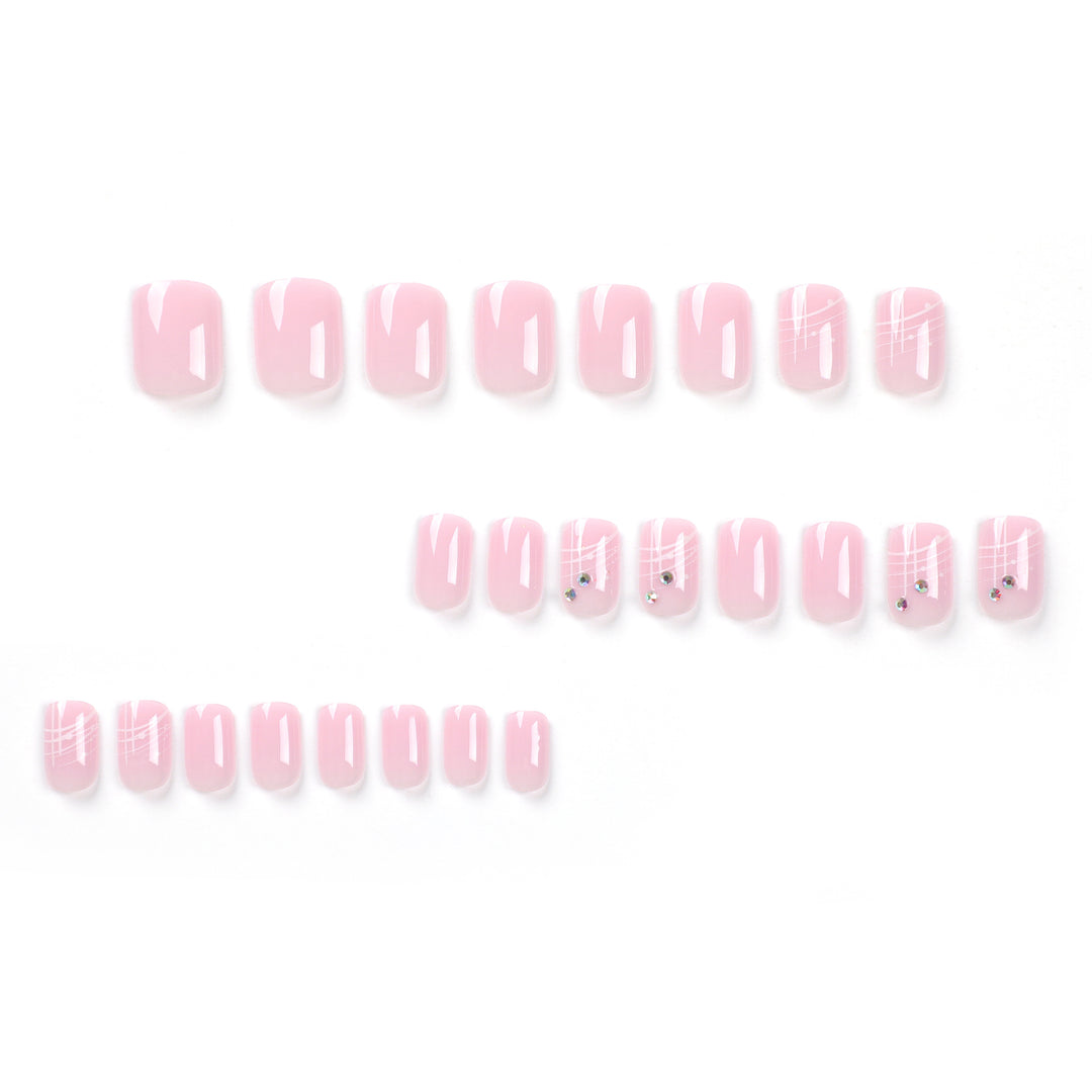 Artful nail extensions with elegant design and rhinestone embellishments Kalsten