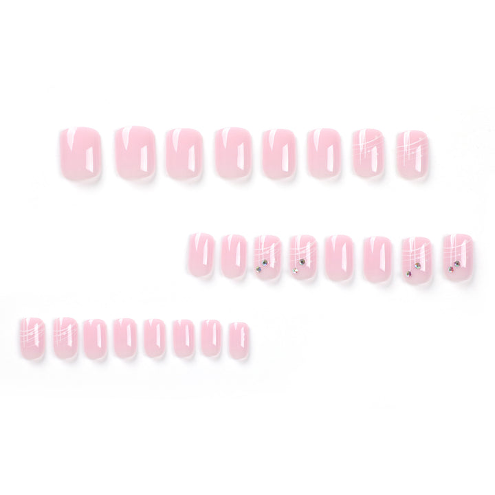 Artful nail extensions with elegant design and rhinestone embellishments Kalsten