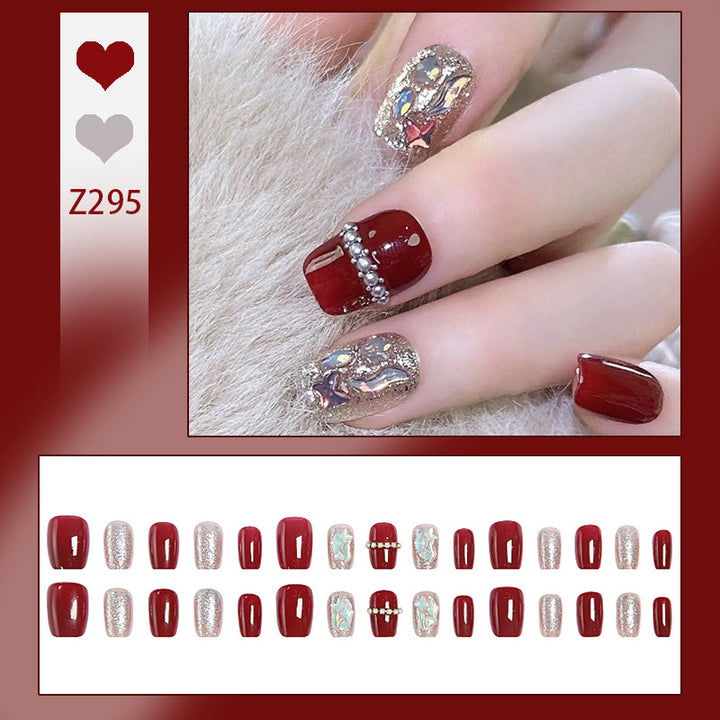 Glamorous artificial nail set with sparkling 3D applications and elegant embellishments Kalsten