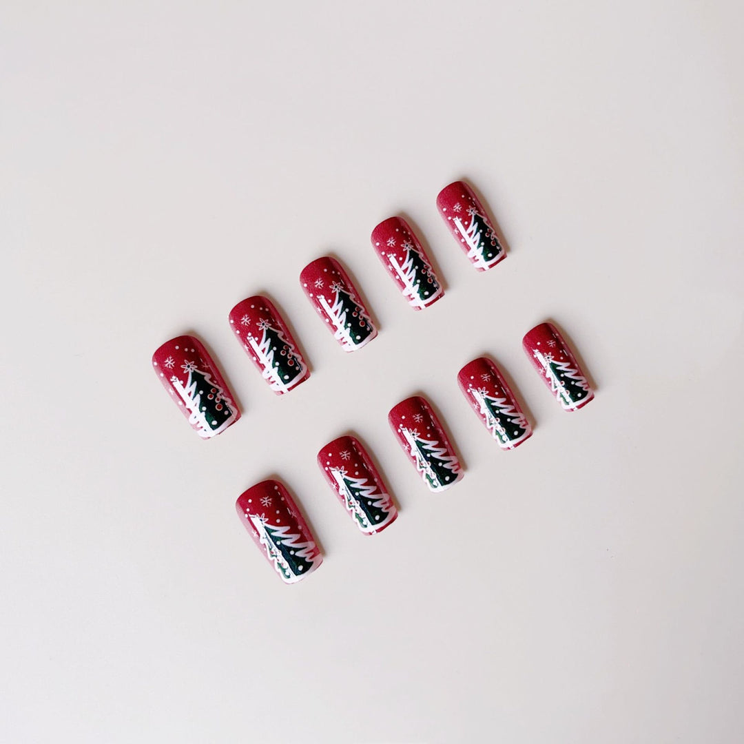 Artificial nail set with festive Christmas designs and glitter accents Kalsten