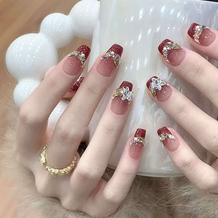Artistic Press-On Nail Design with Gemstone Accents Kalsten
