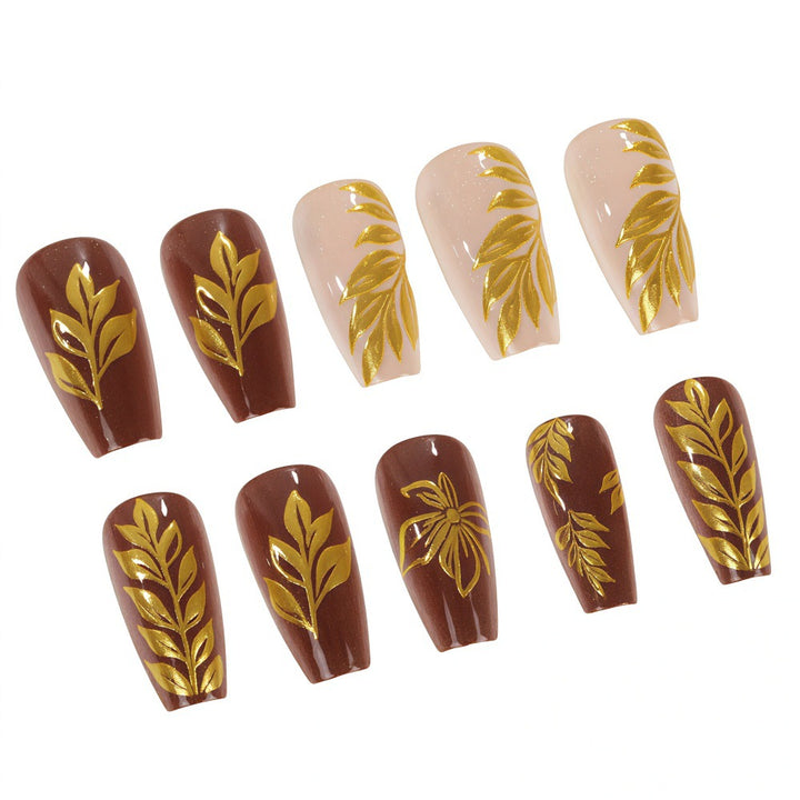 Artificial nails with floral gold design Kalsten