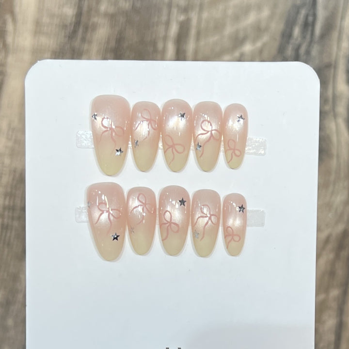 Press-On Nail Set with Bow and Star Accents Kalsten