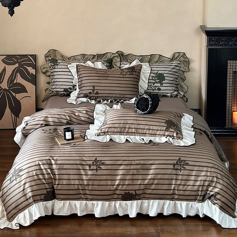 Romantic ruffled bedding set made of cotton satin with striped and floral jacquard