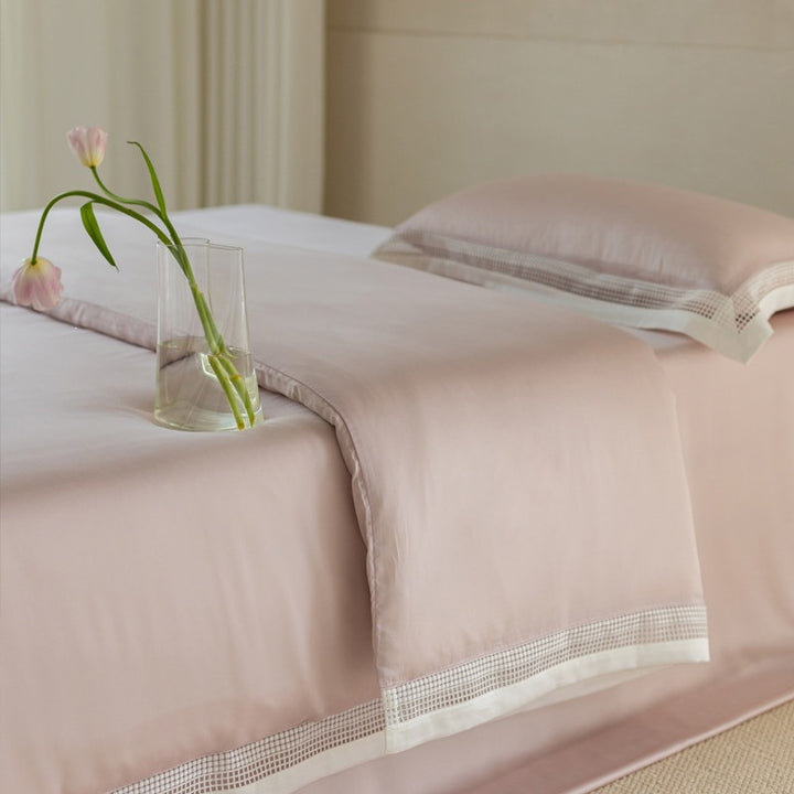 Elegant bedding set with lace grid trim and hotel closure