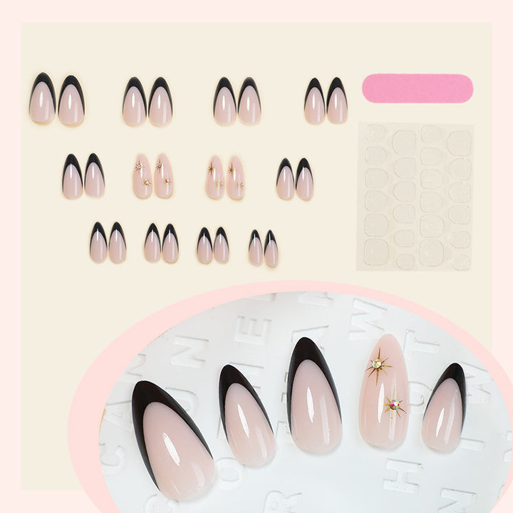 Artificial nail set with elegant black-and-white design and golden star accents Kalsten