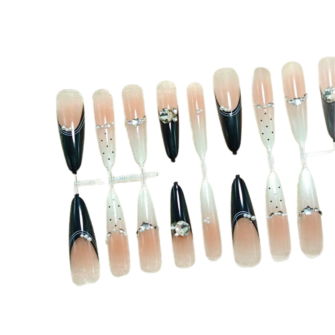 Glamorous artificial nails with glitter accents Kalsten