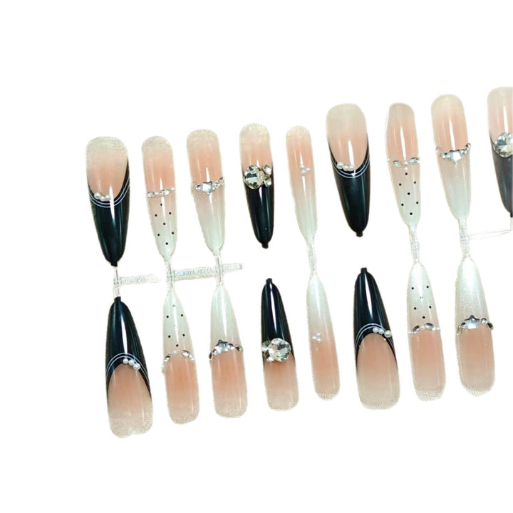 Glamorous artificial nails with glitter accents Kalsten